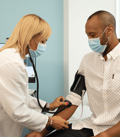 Checking patient blood pressure